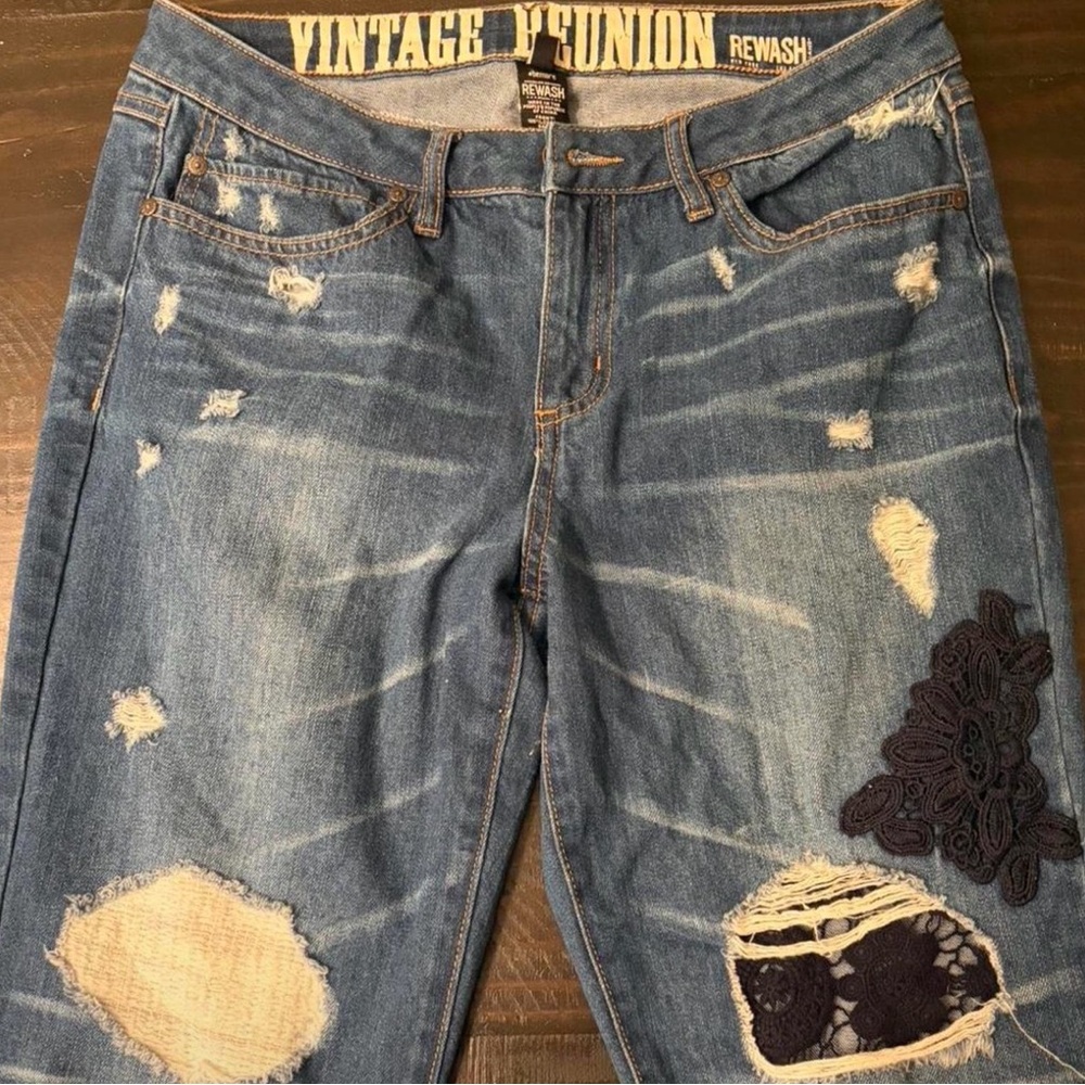 Blue jeans with black lace details